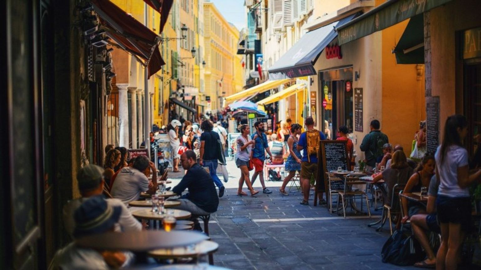 Locals & tourists in the colorful streets of Nice in France during 13 days
