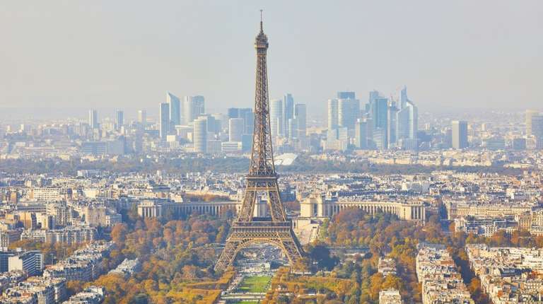 The view of the Eiffel tower in Paris from an aerial point of view in France in September.