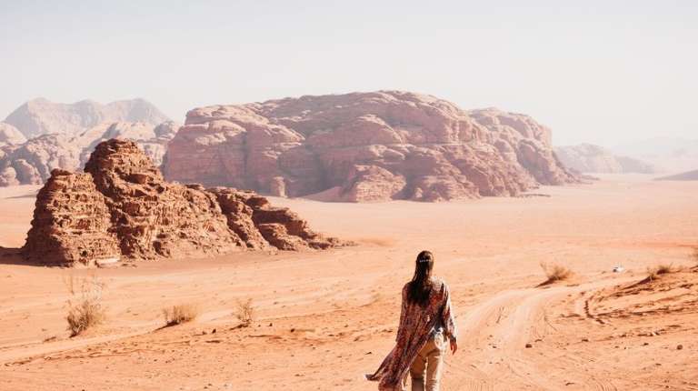 A woman walking in Wadi Rum in Jordan in September.