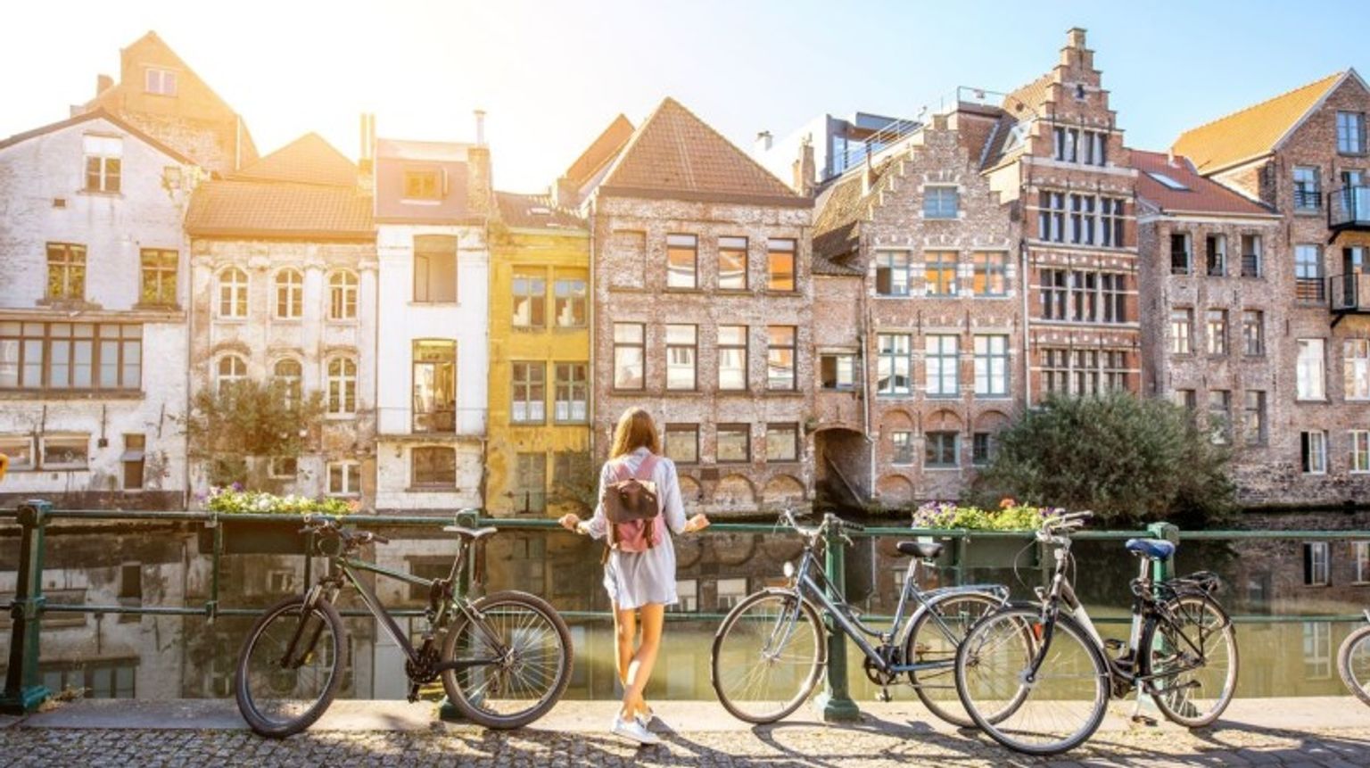 Woman post-cycling in Ghent City as part of spending one week in Belgium.