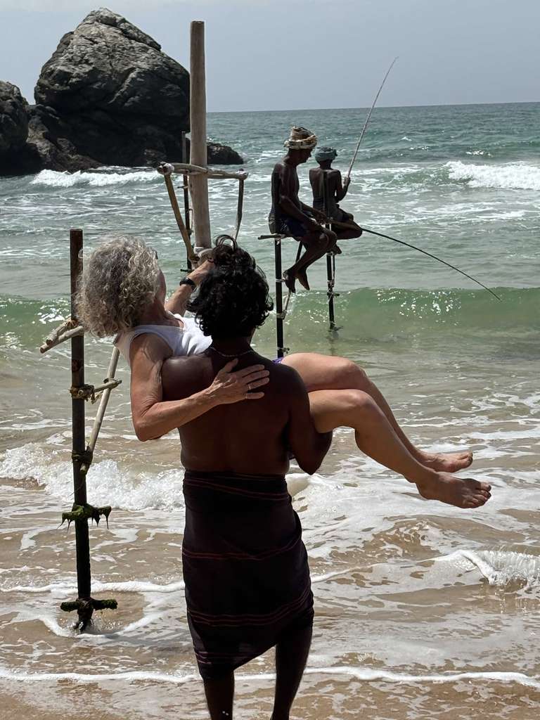 An elderly lady is carried off to the sea buy a fisherman