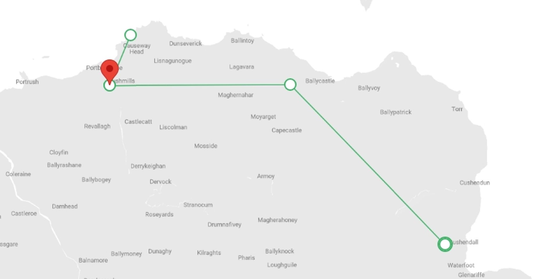 A map showing the tour itinerary for the trip: Walking the Antrim Coast, starting in Cushendall, Ireland and ending in Bushmills, Ireland going through 2 other destinations.
