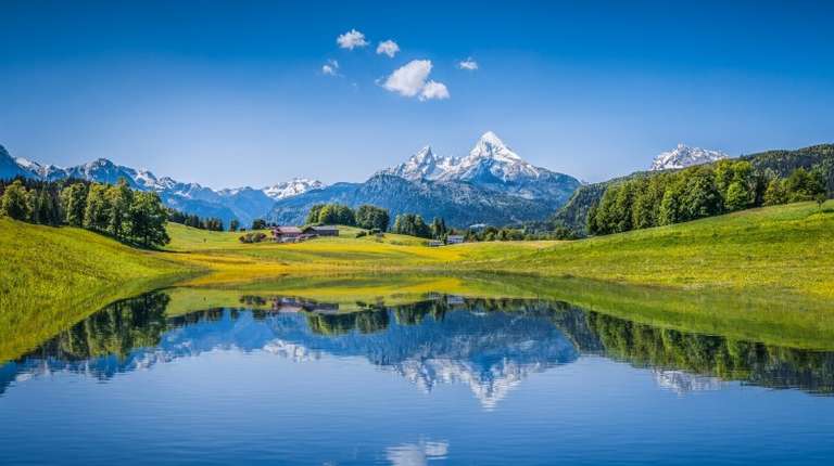 Stunning view of lake and mountains in the Alps, 10 best places to visit in Europe.