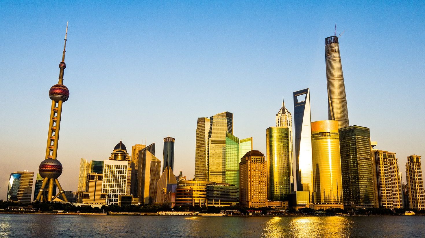 The Pudong skyline, during sunset, looks like a city made of gold