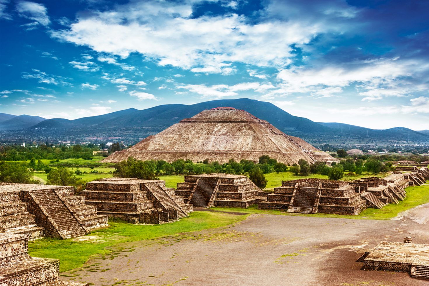 The Mesoamerican pyramids of Teotihuacan with hills in the distance. 