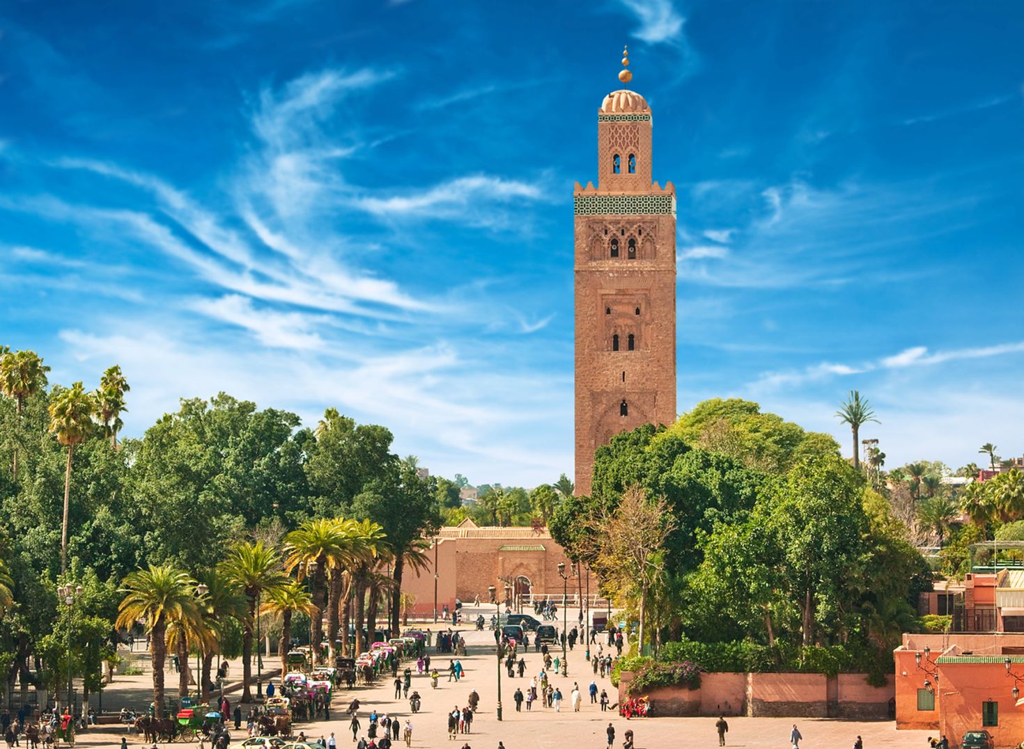 The view of the main square of Marrakech during the day with clear skies. 