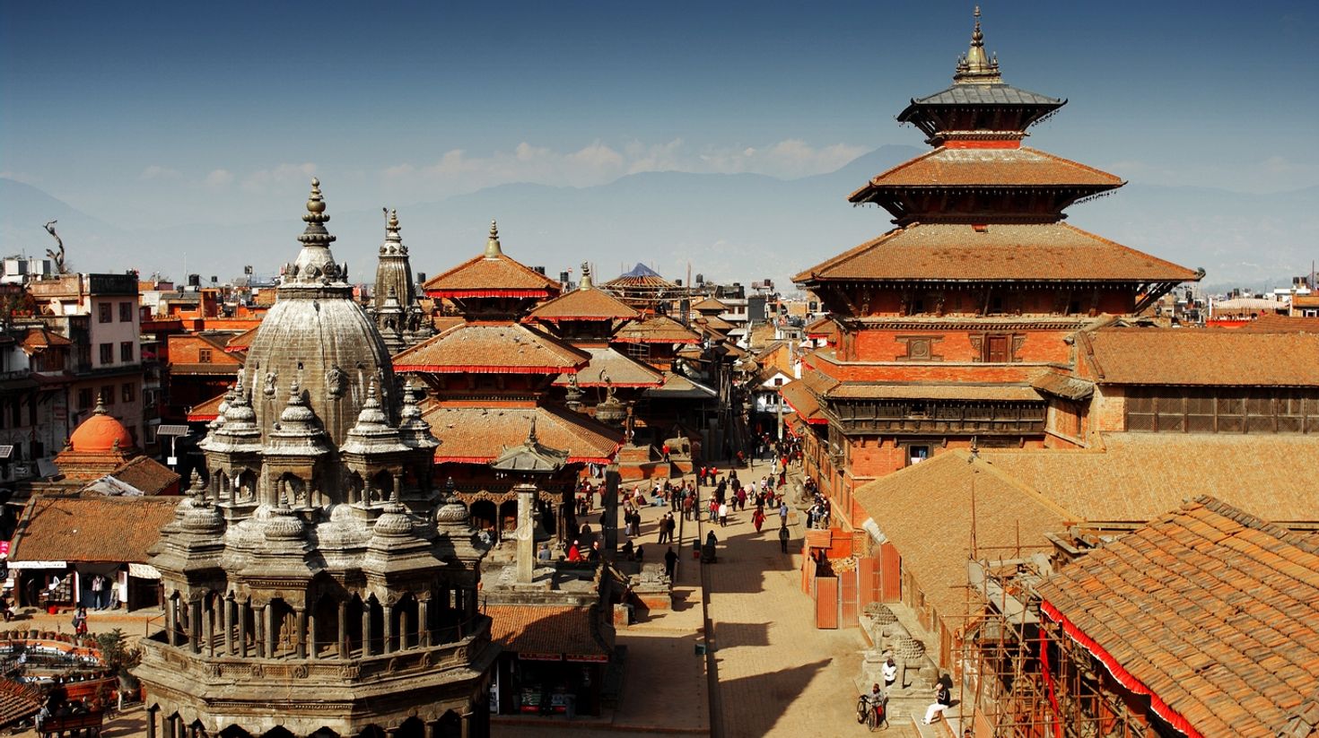 Patan Durbar Square with hills in the background in Nepal.. 