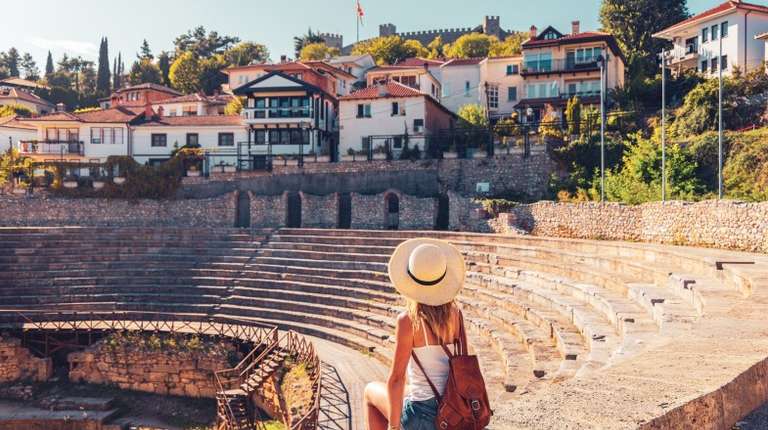 A woman in an old roman theatre in Ohrid, Macedonia during a Europe trip
The Ancient theatre of Ohrid was built in 200 BC and belongs to the Hellenistic