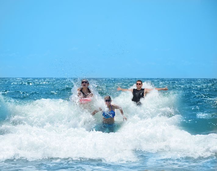 People enjoying and having a good time in the sea in Florida. 