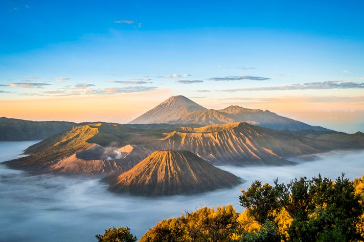 A wide shot view of the Mount Bromo with Semeru Volcano in the background.