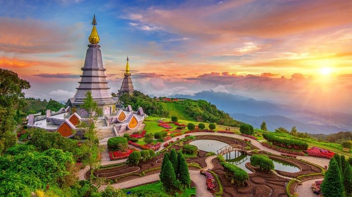 Ancient temples with green trees in Chiang Mai Thailand. 
