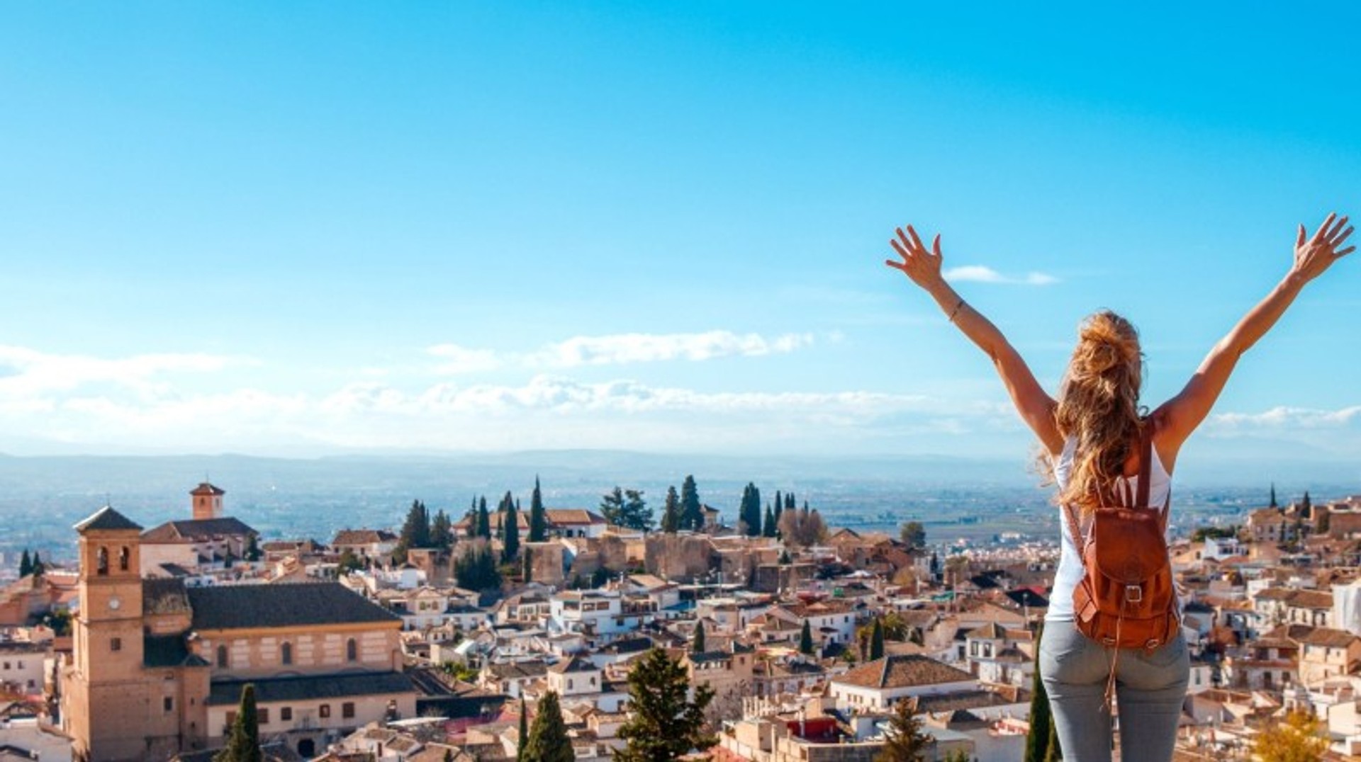 A girl in Granada with open arms during her 3 weeks in Spain.