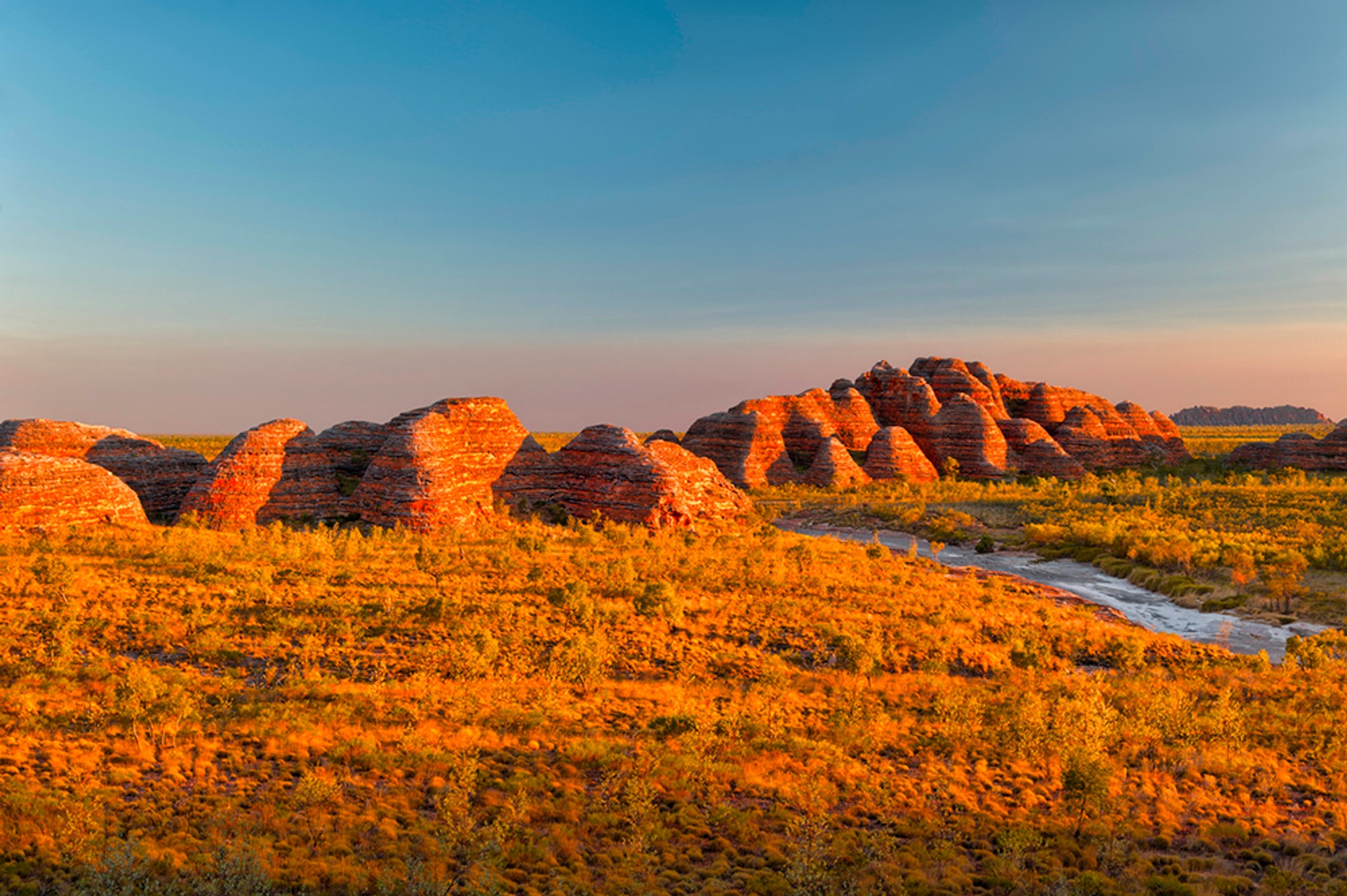 The Bungle Bungle Range of Purnululu National Park is a great place to admire the sunset in the Australian outback.