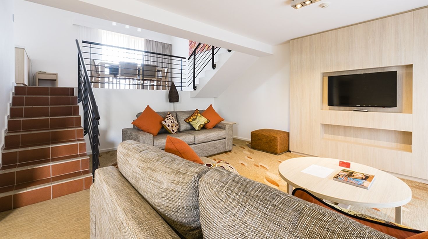Emu Walk Apartments include apartments that even come with a living room.