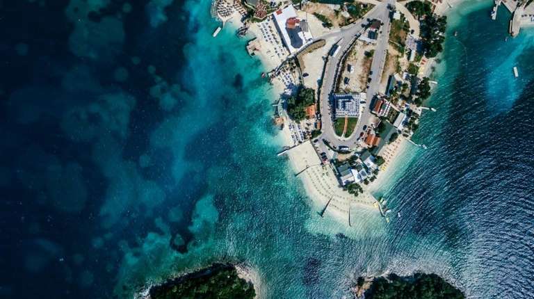 Visit Ksamil beach in blue waters of Ionian Sea during 6 days
