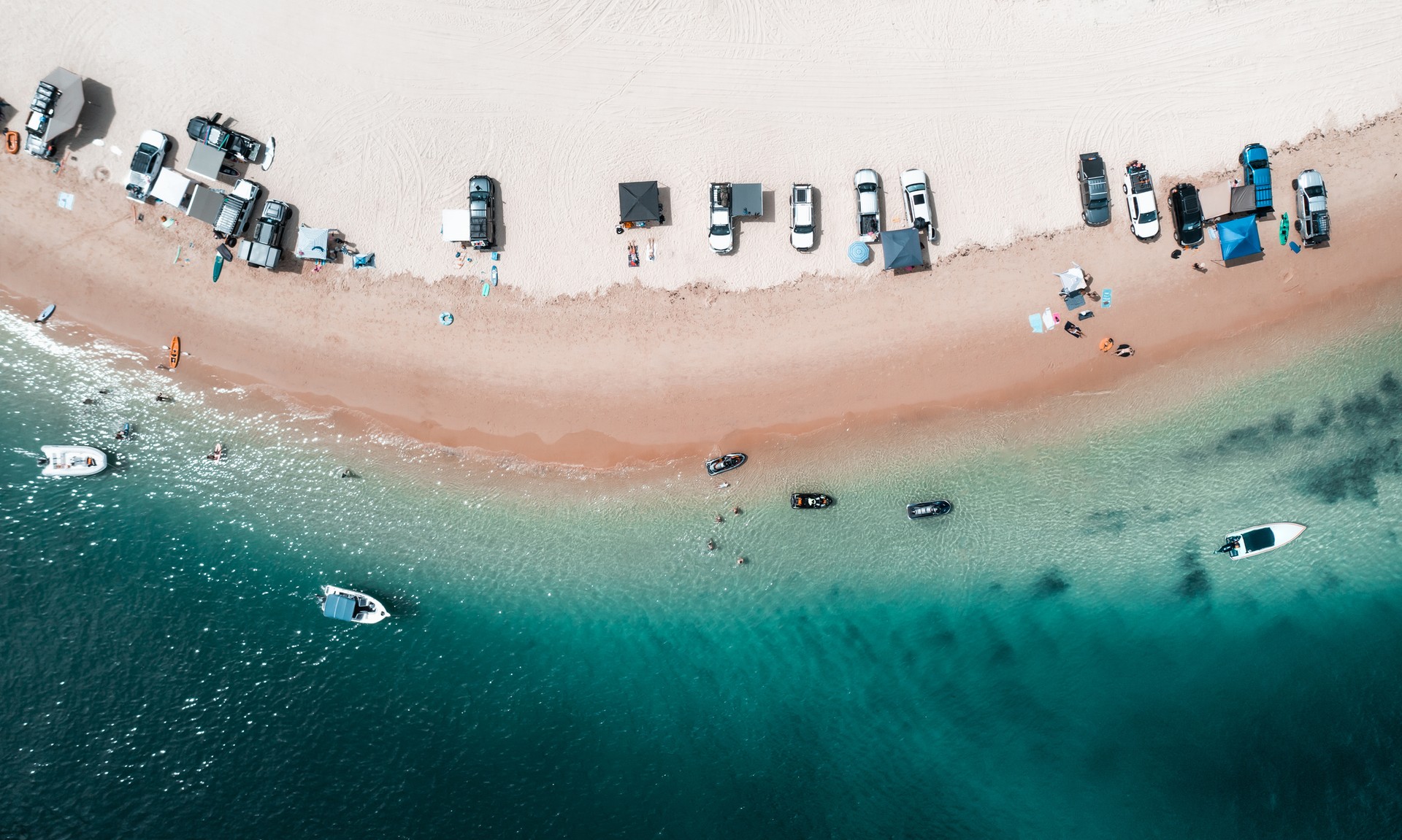 Explore the sunny coastline of Queensland in Australia during March. Aerial photograph of the coastline in the Tangalooma region of Moreton island of Australia in March.