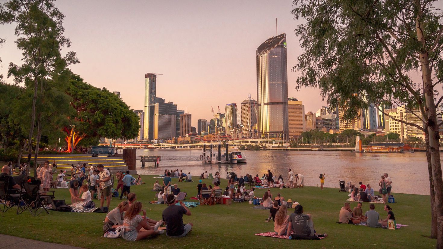 Picnics on Riverside Green in South Bank, a recreational area in Brisbane,