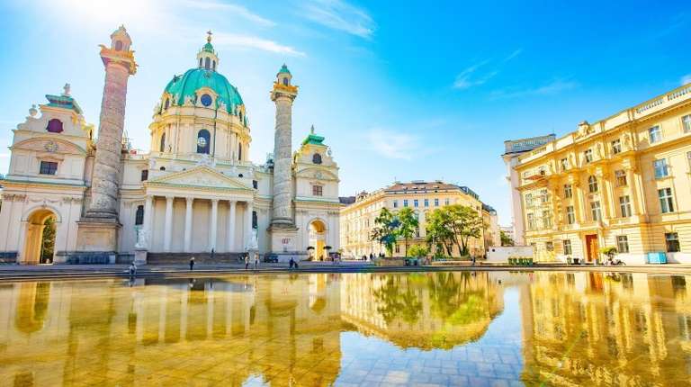 See Karlskirche in Vienna while spending 2 weeks in Austria.