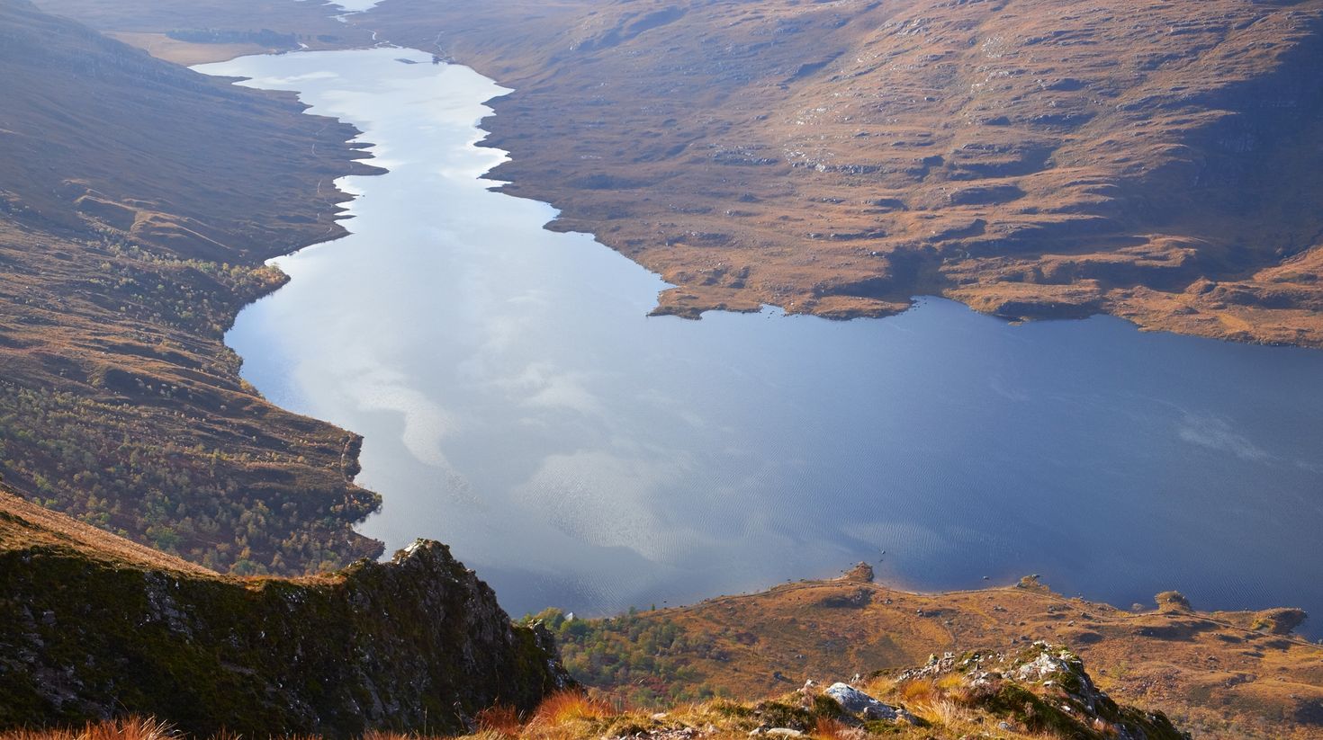 This popular Scottish trail takes you along the shores of Loch Damh and then up Beinn Damh for a tricky ascent and beautiful views of the Torridon mountains and sea