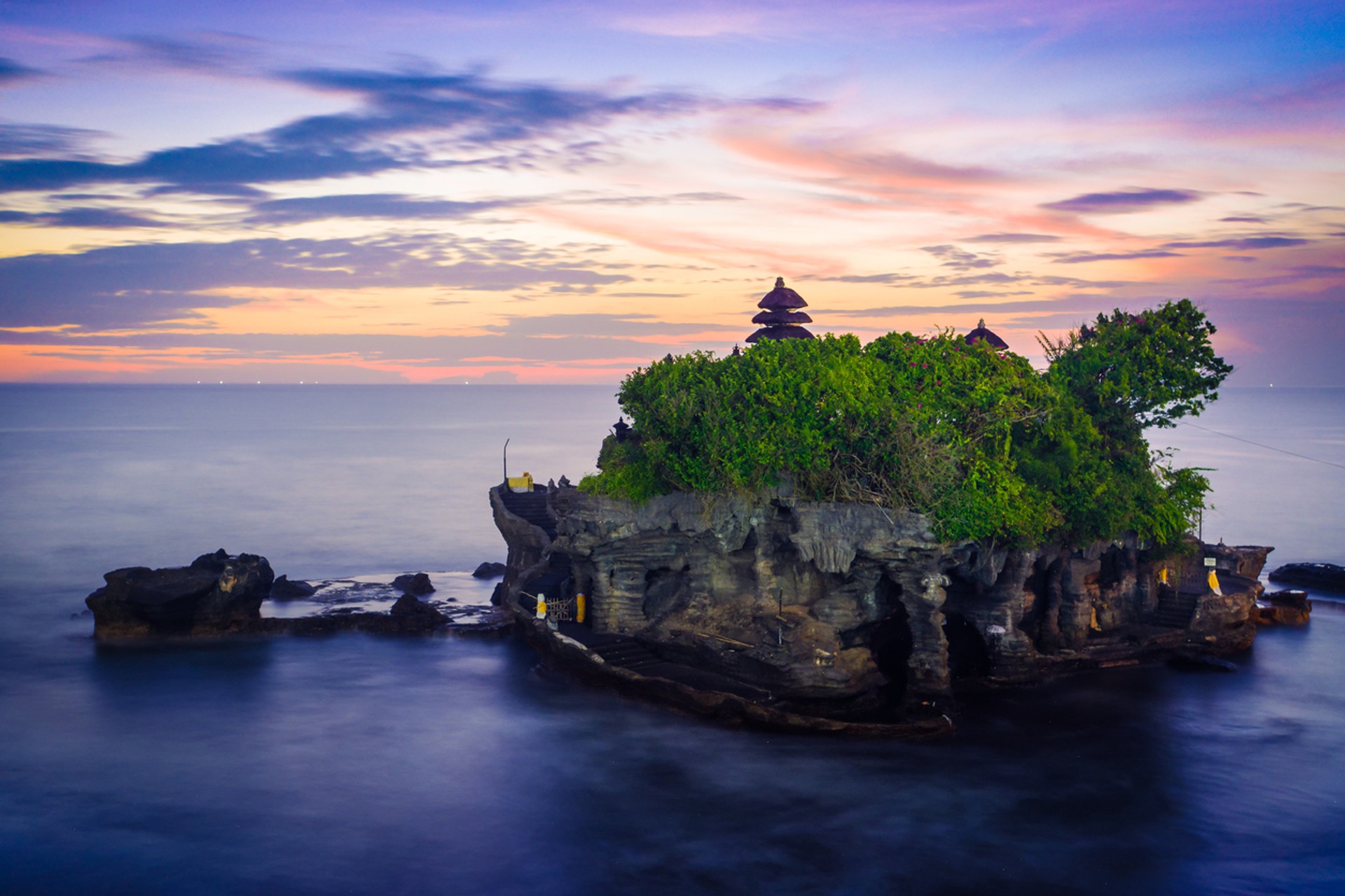 One of the most picturesque places to visit in Indonesia is the Tanah Lot standing atop an enormous rock. Tanah Lot is one of the most picturesque places to visit during 10 days in Indonesia.