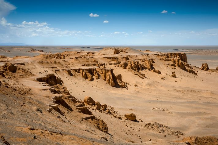 The Flaming Cliffs of the Gobi Desert on a clear day in Mongolia. 