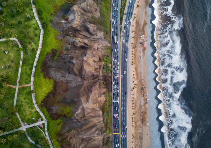 An aerial view of Coste Verde with rainforest on the left and beaches and sea to the right. 