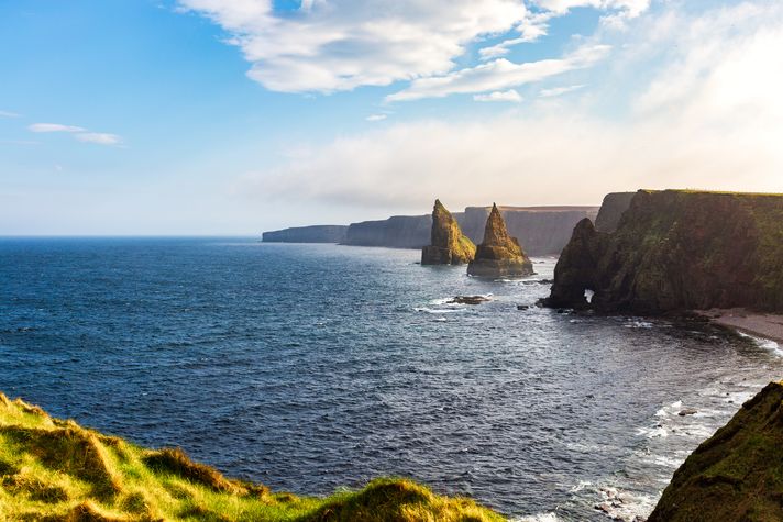A wide coastal view along the NC500 stretch in Scotland. 