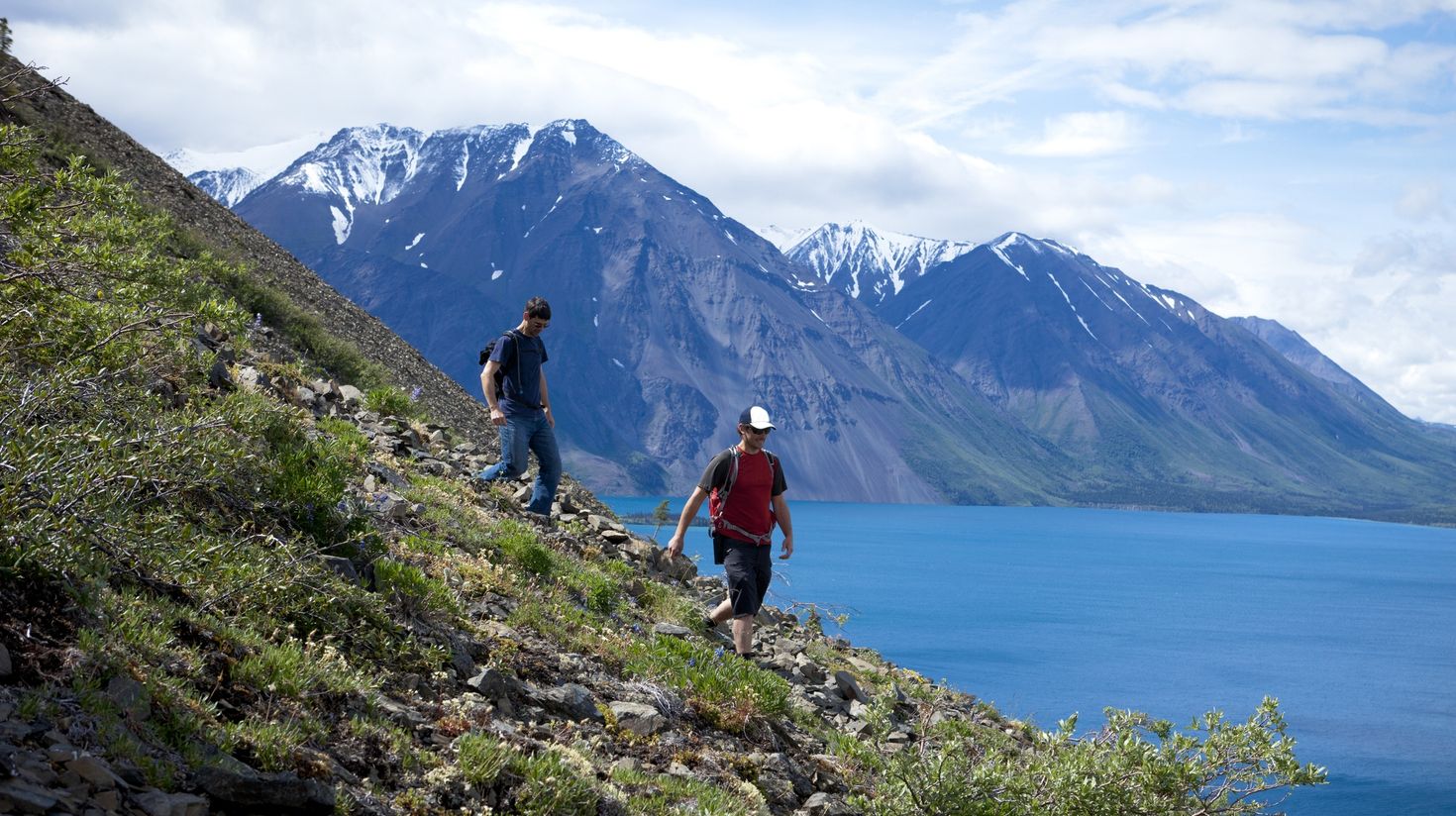 Two hikers walking on the Yukon territory