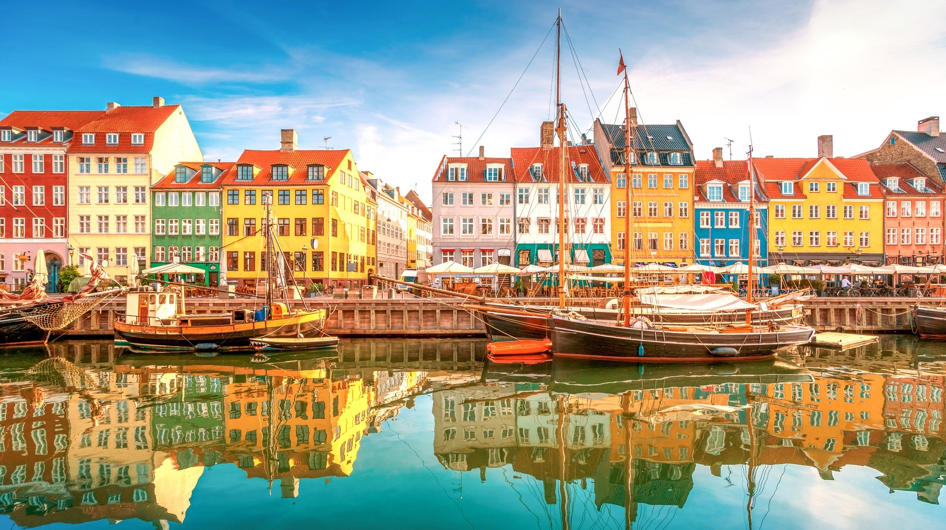 Nyhavn a perfect spot to go for a canal tour Nyhavn, a picturesque canal with many old houses and sail ships