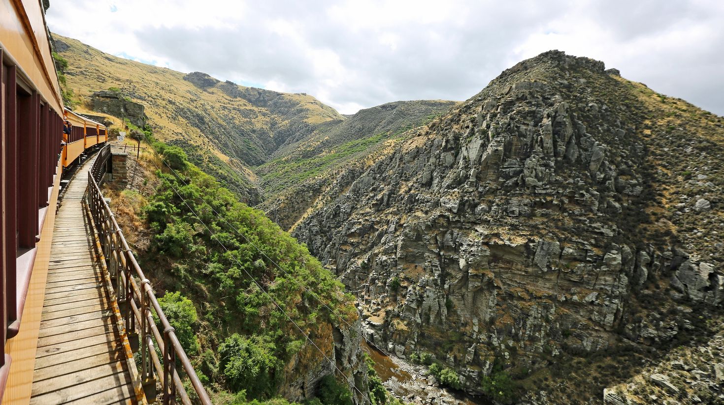 Hop on the Taieri Gorge Railway in New Zealand.