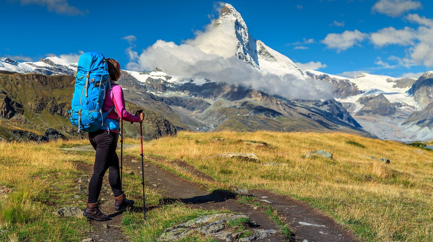 The Matterhorn is a classic peak, a sharp, isolated rock pyramid with steep narrow ridges jutting from surrounding glaciers.