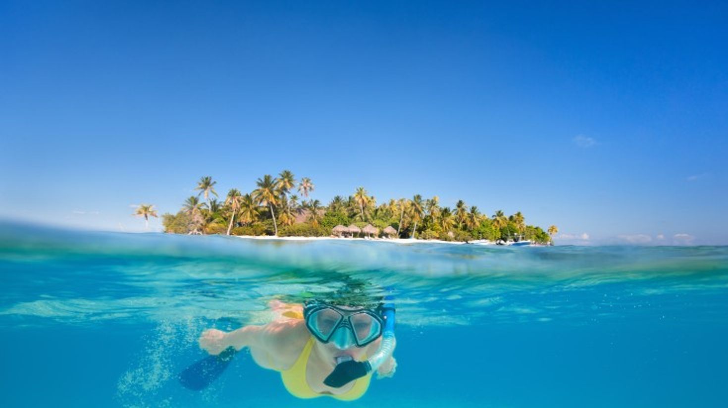 Woman snorkeling in the tropical paradise of Kendwa Beach.