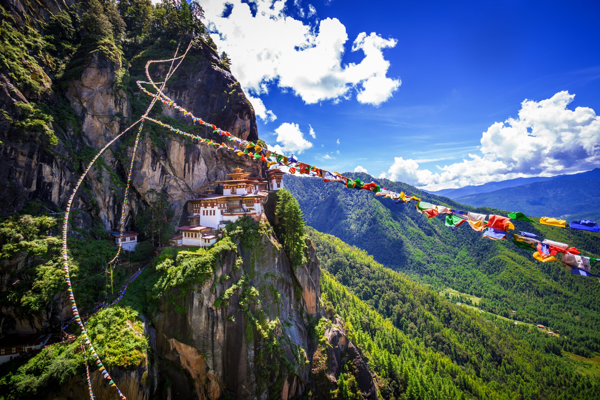 Located over the mouth of a cave, Tiger's Nest is a sacred Buddhist monastery in Bhutan Tiger's Nest Monastery is a beautiful and unique place to visit in 5 days in Bhutan.