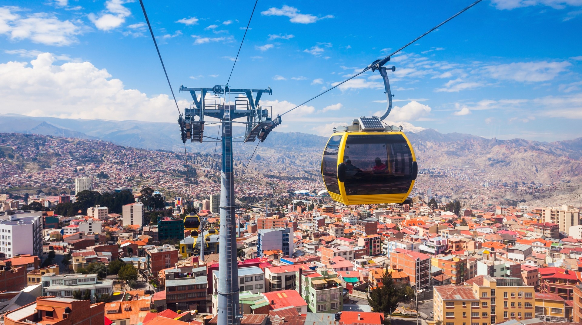 Dry days, clear skies, temperate climate, and an abundence of festivities makes August one of the best months to travel to Bolivia. Mi Teleferico is an aerial cable car urban transit system in the city of La Paz, Bolivia.