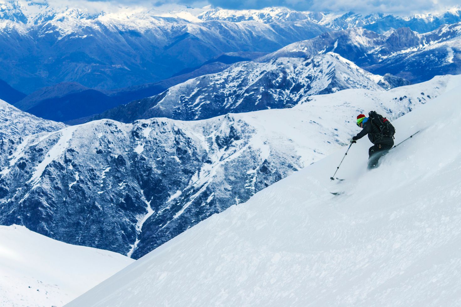 A man skiing in the mountains of Chile.