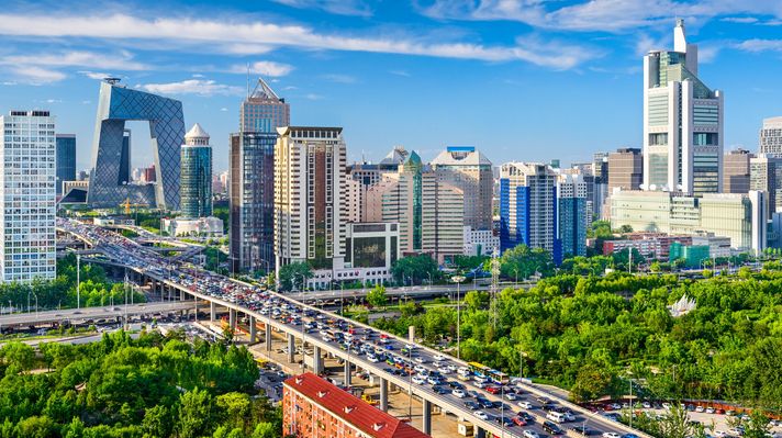 Beijing skyscrapers and traffic from a distance on a clear, sunny day