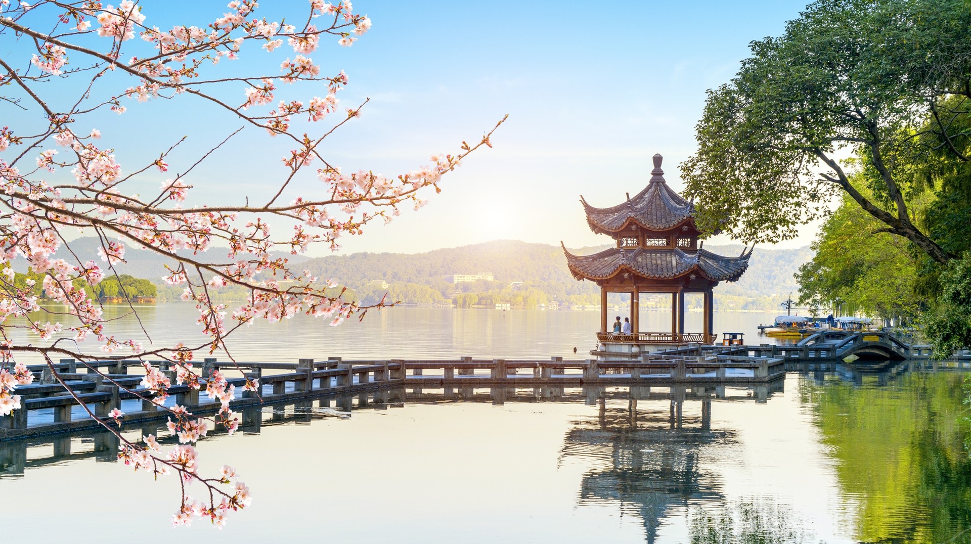 Visit the beautiful West Lake in Hangzhou while spending 4 days in China. A beautiful view of West Lake during your 4 days in China.