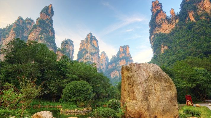 See Avatar mountain's with pillar-like formations at Zhangjiajie Park while spending one week in China.