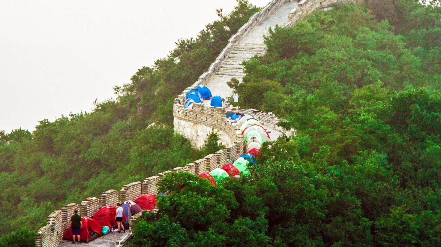 Tourists camping at the Great Wall of China.