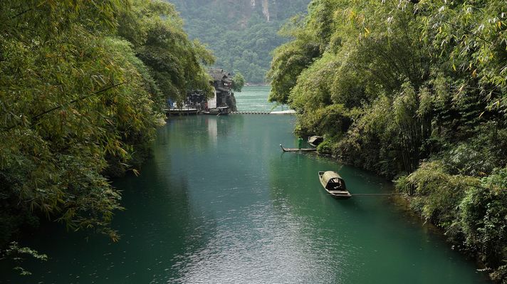 Small boat near the Three Gorges Dam which is one of the biggest dam in the world.