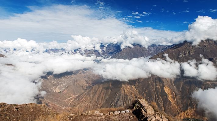 Morning clouds gather around in the Colca Canyon