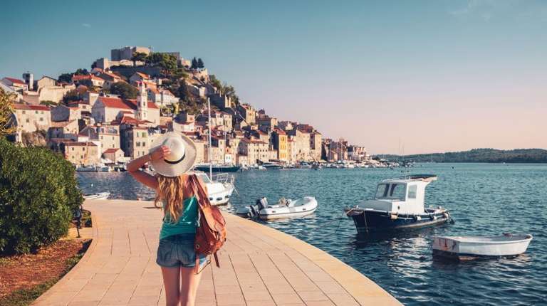 A girl admiring the beauty of the country and the Adriatic sea during her 6 days in Croatia.