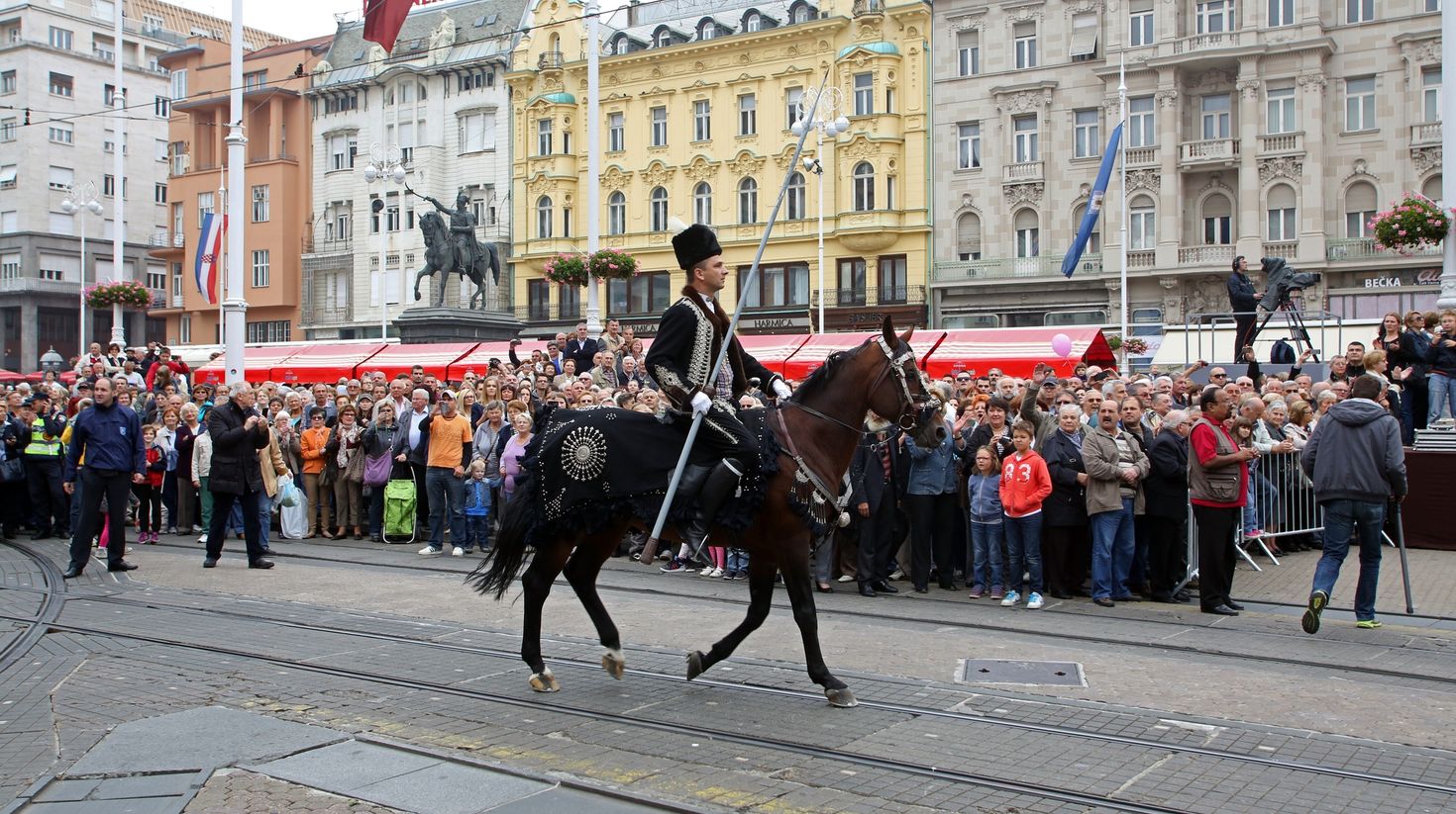 Watch participants on their horses compete in the Sinjska Alka in Croatia.