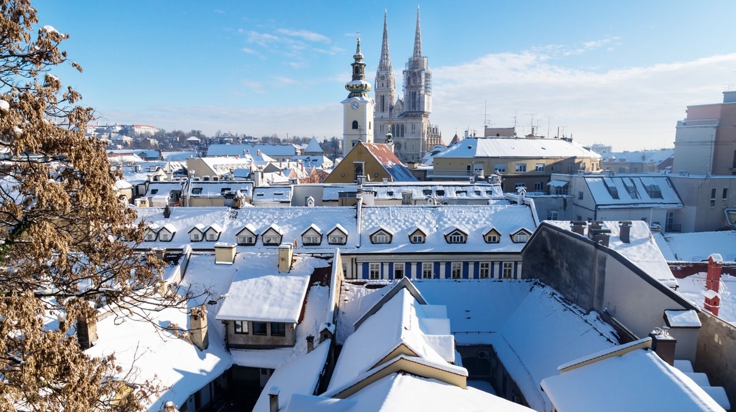 Watch Zagreb blanketed in snow on your trip to Croatia in December.