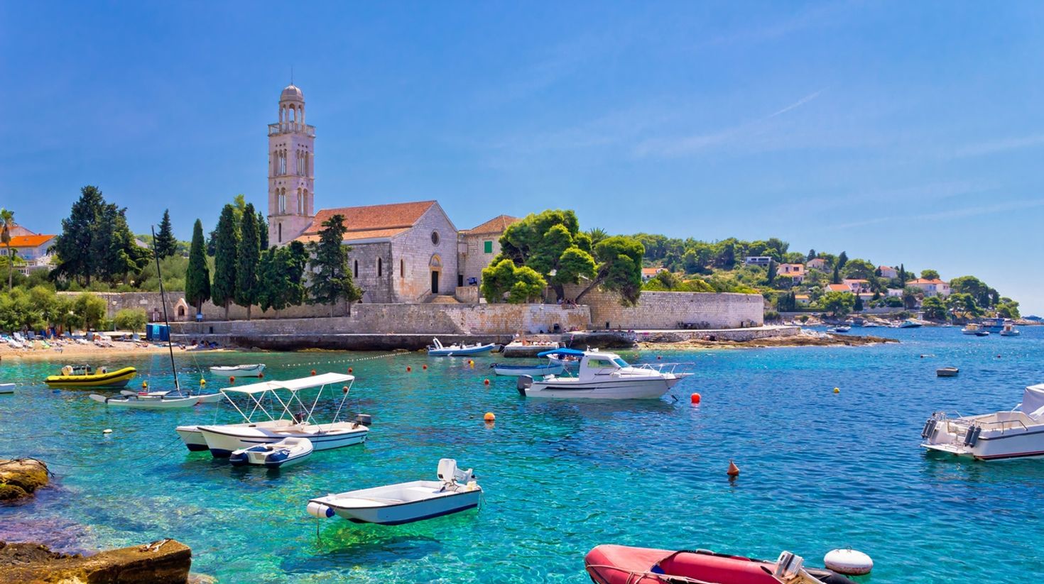 Watch the turquoise sea of Hvar island in Croatia in July.