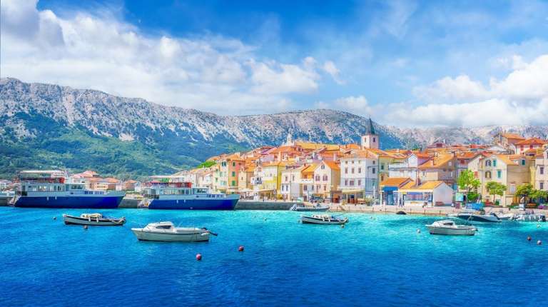 Get this view of Baska town while spending one week in Croatia.