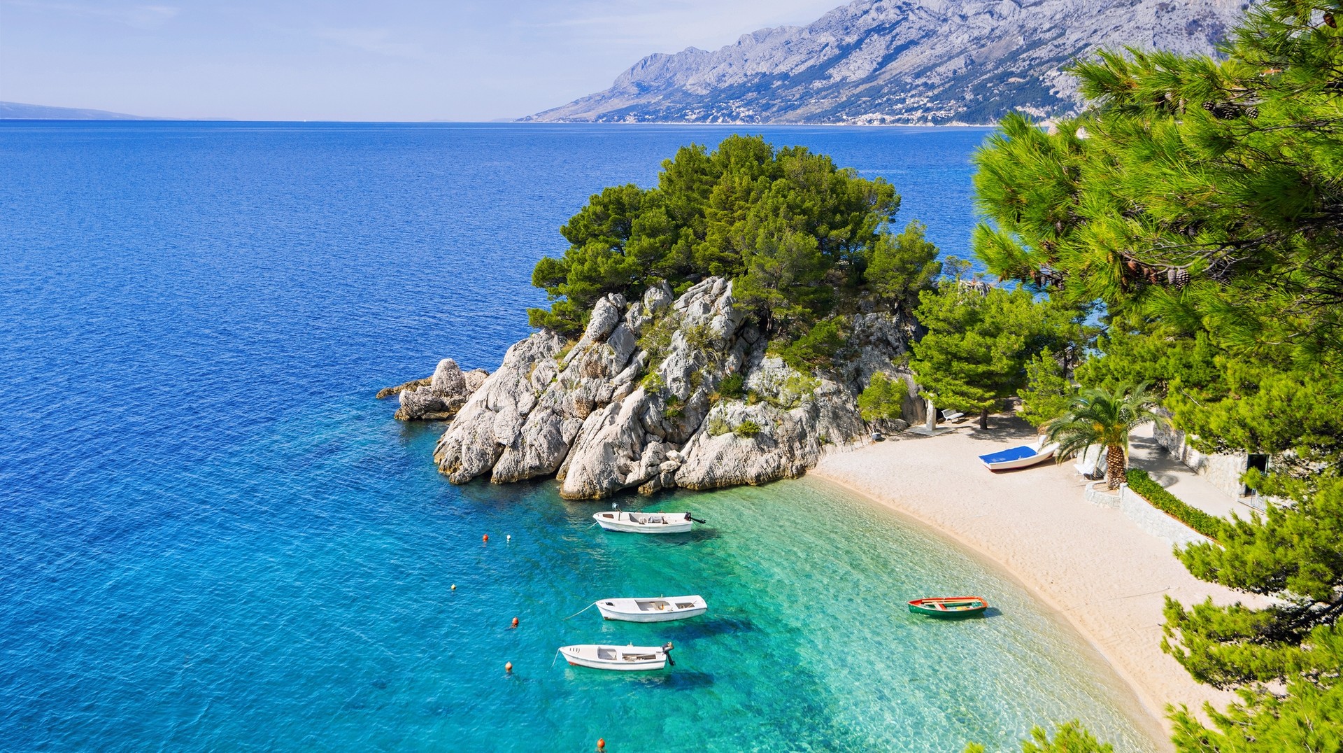 Visit beautiful beaches in Makarska riviera in Croatia in September.