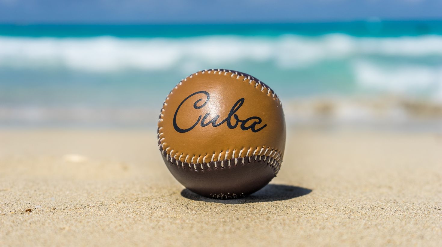 baseball on a beach in Cuba in August