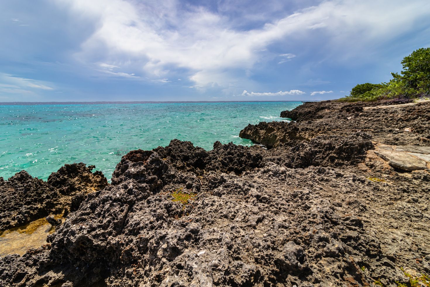 View of the Caribbean sea water in the rock coast - Bay of Pigs, Cuba
