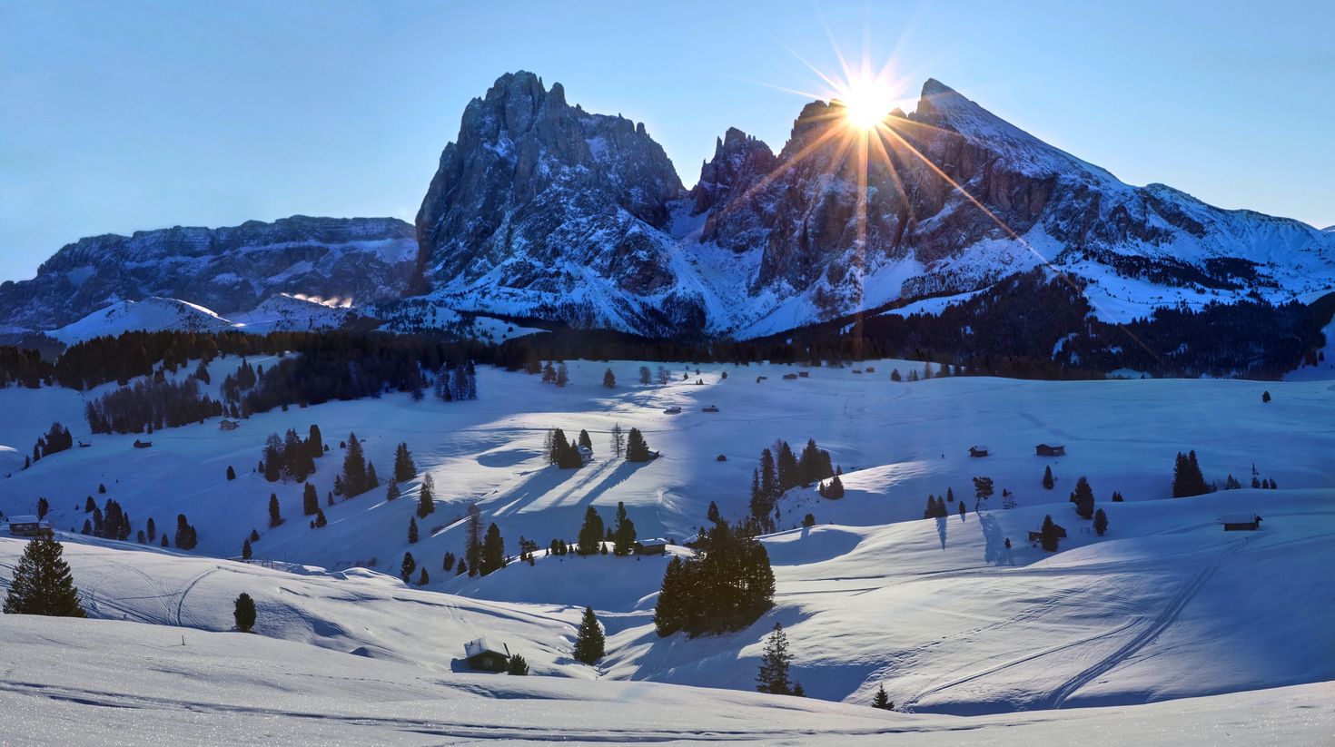 A spectacular view of Sassopiatto and Sassolungo during winter.